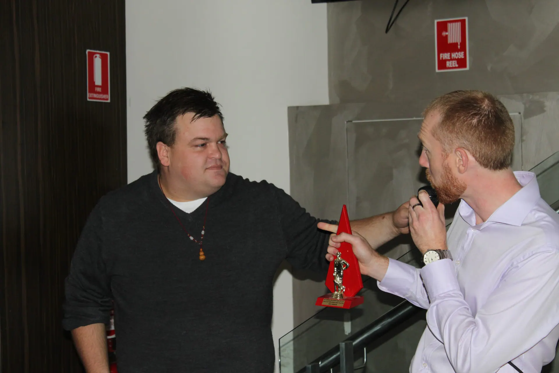 The club best-player trophy changing hands · 2015