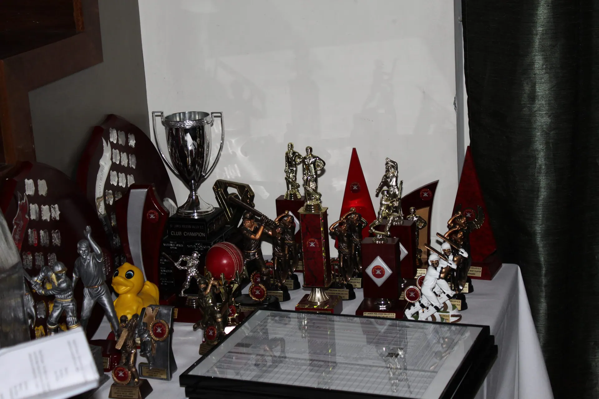 The trophy table: club champion cup, perpetual shields, and a season's worth of awards · 2015